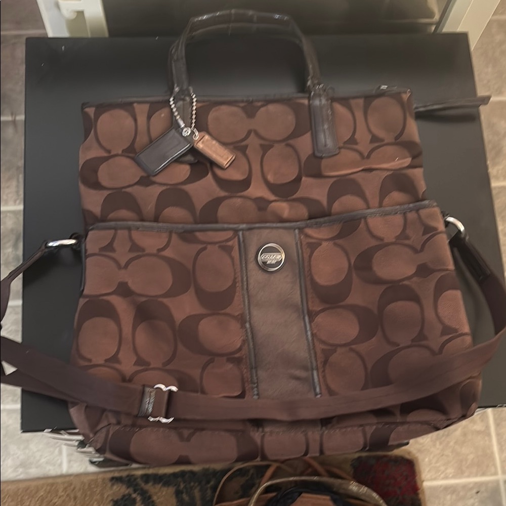 Coach brown purse, fold over style, lots of pockets and room